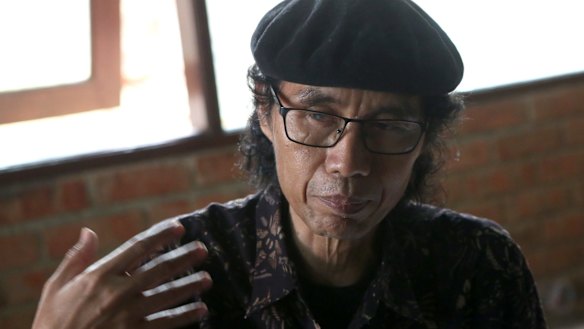 Indonesian activist Sandyawan Sumardi works with the people of Bukit Duri.