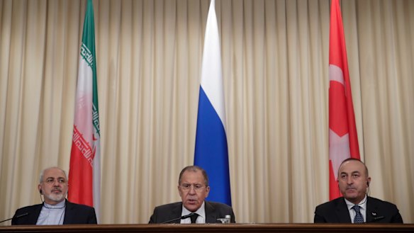 Iranian Foreign Minister Mohammad Javad Zarif, left, Russian Foreign Minister Sergei Lavrov, centre, and Turkish Foreign Minister Mevlut Cavusoglu at a joint press conference after their talks in Moscow.