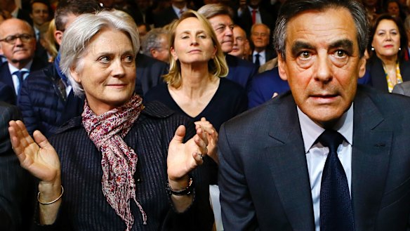 Francois Fillon, right, with his wife Penelope during a rally of his Republican Party in Paris in November.