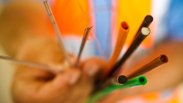 Telstra is offering compensation to 42,000 customers over slow NBN speeds.