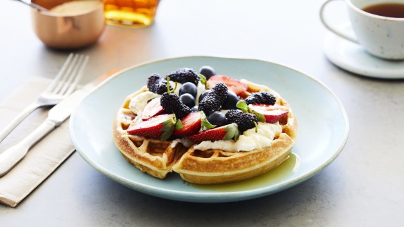 Waffles with fruit and labneh.