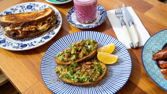 Avocado toast is finished with feta and dukkah at Meraki.