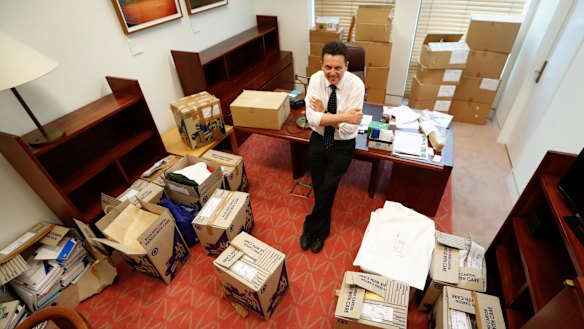 Senator Nick Xenophon with the packing boxes in his office.