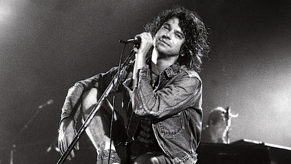 On stage with INXS in 1994.