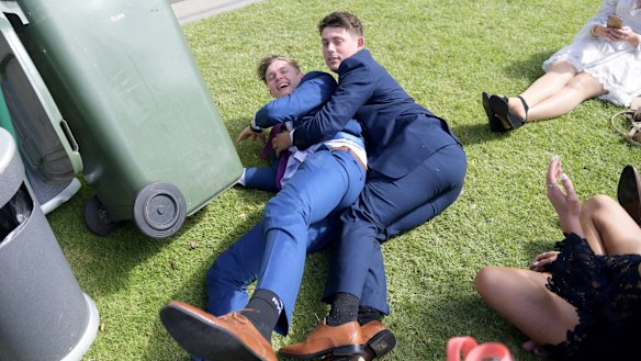 Racegoers at the end of a long day.