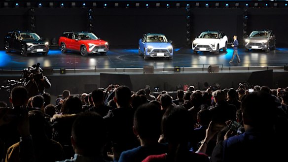 William Li, Founder and Chairman of Chinese automaker NIO launches the NIO ES8 electric SUV in Beijing on December 16.