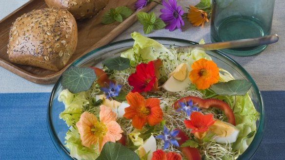 Nasturtiums and other edible flowers are delicious in salads.
