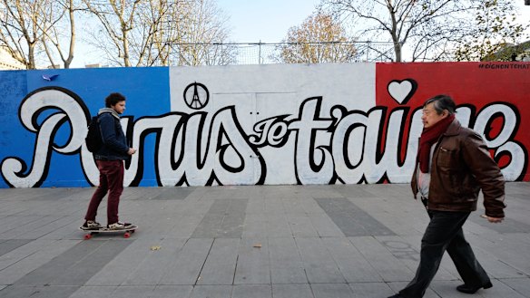 As Paris reeled from the worst attacks France has known since the end of World War II, its street artists took to city walls and billboards to paint notes of defiance. Here the words say 'Paris, I love you'.