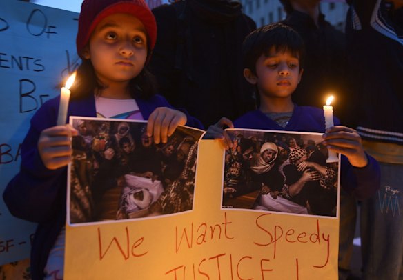 Pakistani children at a vigil for the victims of the attack.