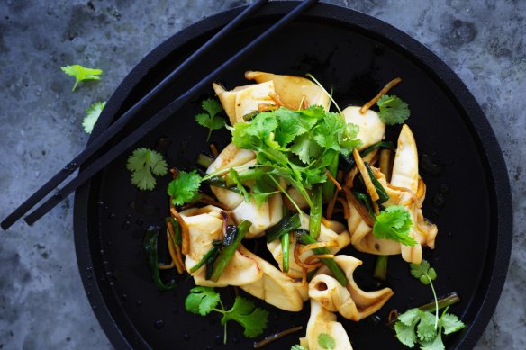 Stir-fried squid with ginger and spring onion.