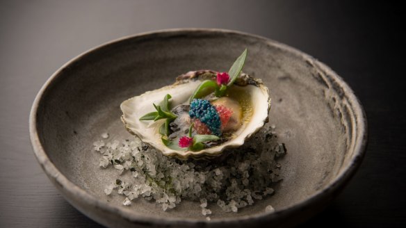 Angasi oyster with finger lime and scampi caviar from the Bentley bar menu.