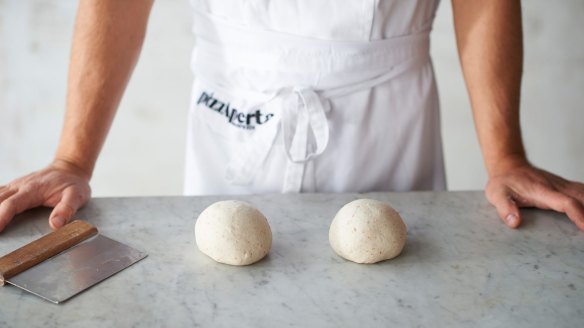 Shaping the dough step 6: Place the balls on a covered non-stick tray. Make sure there is at least one ball width between each ball and the edges of the tray and that the balls don't touch the cover. Use a fine mist water spray to hydrate the surface of the balls once they are on the tray. Let rise for 1 hour at 20–24C. After resting, place in a refrigerator for at least 12 hours and up to 18 hours. The balls can sit in the refrigerator at around 4–5C for up to 3 days.