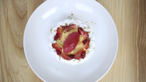 Yuzu lime curd with Italian meringue and raspberry sorbet.