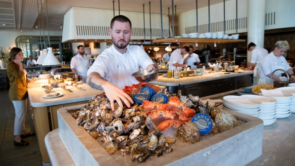 Shellfish and caviar piled high on mountains of ice.