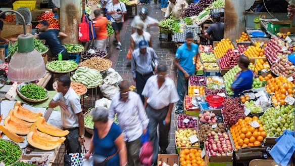 A market in Port Louis, the capital of Mauritius, whose melting-pot cuisine reflects its colourful history.