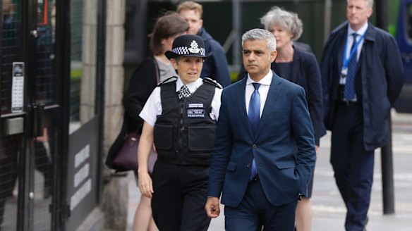 Metropolitan Police commissioner Cressida Dick and London mayor Sadiq Khan walk near the London Bridge and Borough Market area.