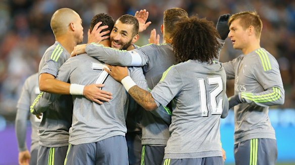 Cristiano Ronaldo is congratulated by his Real Madrid team mates after scoring the second goal.