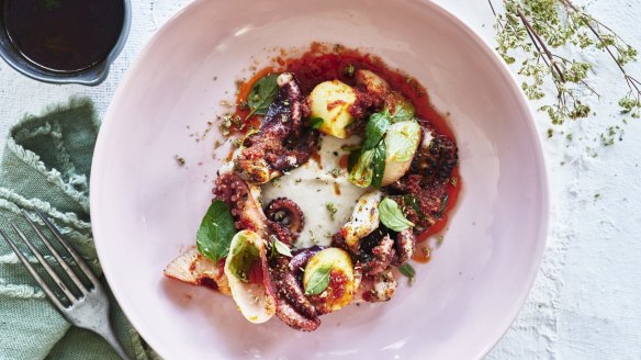 Grilled octopus with anchovy dressing, potatoes, onions and 'nduja oil.