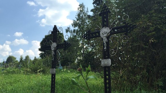 Dmytryshchak family graves at a churchyard in Oporets.