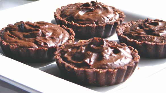 Chocolate-vanilla tarts with chocolate almond crust.