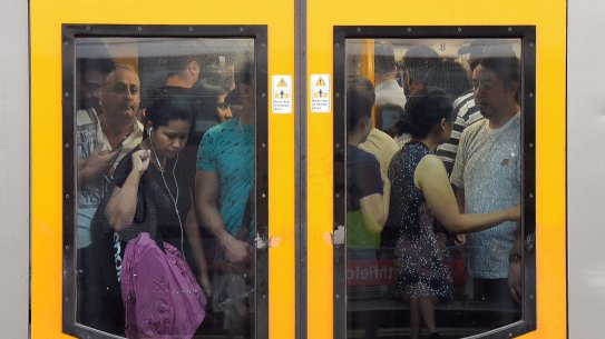 Trains arriving at Strathfield already full of commuters on Thursday morning.  