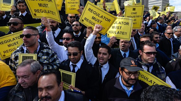 Taxi drivers protesting at Parliament House over the Uber X App that they say is destroying their business.