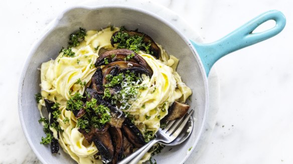 Creamy fettucine alfredo with garlic mushrooms.