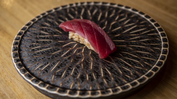 Akami zuke (marinated ruby-red tuna) nigiri.