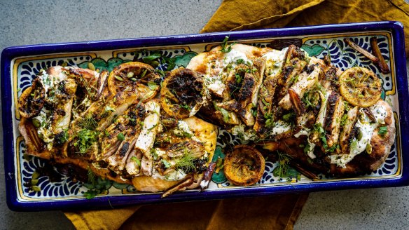 Flatbreads topped with chermoula marinated chicken, charred lemon, dates and tzatziki.