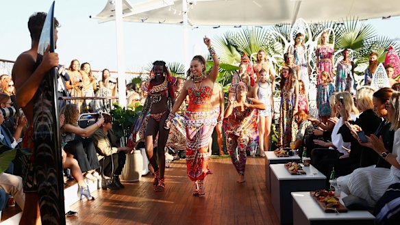 Camilla Franks walks with models during her show aboard The Seadeck vessel in Sydney for Mercedes-Benz Fashion Week in May. 