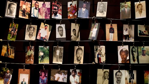 Family photographs of some of those who died hang in a display in the museum.