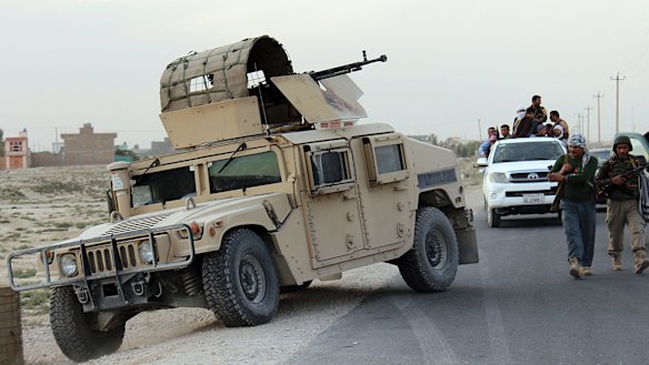Afghanistan's security forces patrol  Kunduz on Tuesday.