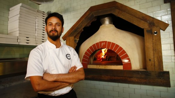 The pizza oven gets a good workout by the chefs at night.