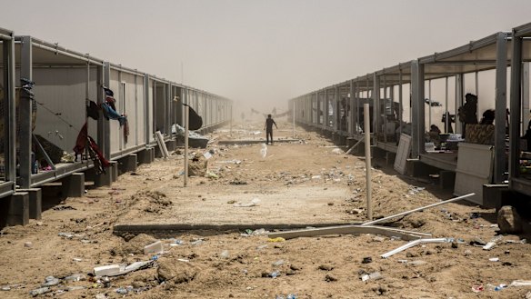 Families displaced by fighting in the Anbar Province occupy half-built structures at a camp in Amiriyat Fallujah.
