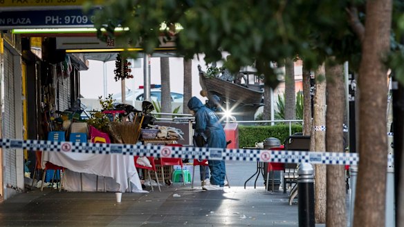 Forensic officers at the scene of the schooting. 