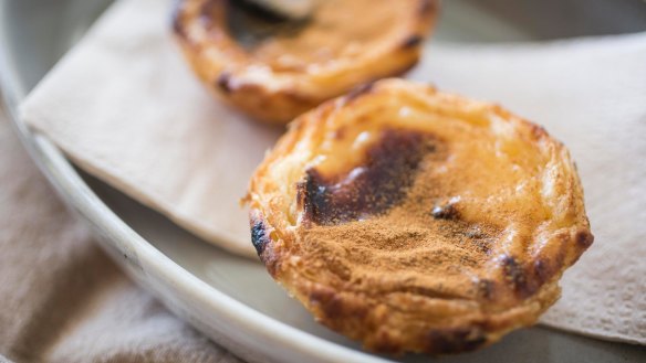 CInnamon and sugar crusted custard tarts.