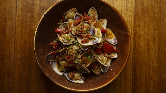 Byron Bay restaurant Karkalla uses dried pipis for its XO sauce, which is then added to a dish of wok-fried fresh pipis.