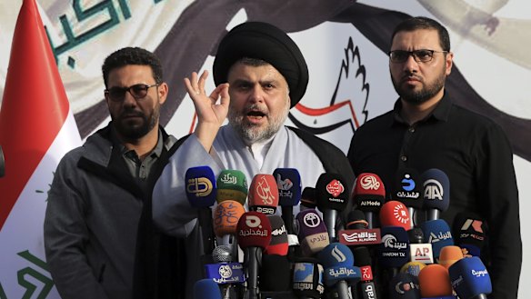 Shiite cleric Muqtada al-Sadr, speaks to his supporters and Arab media before entering the highly fortified Green Zone during protests in March.