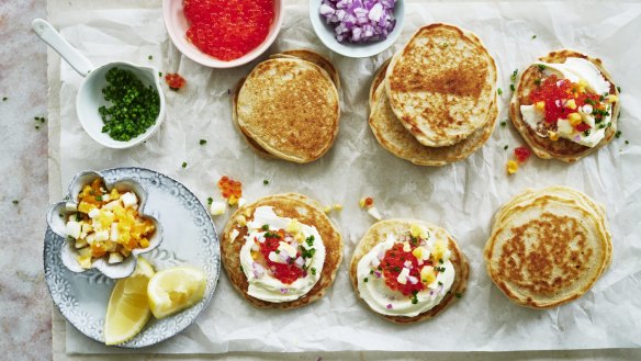 These buckwheat blinis are the perfect vehicle for a caviar party with all the trimmings (sour cream, chopped chives, boiled egg and onion, pictured).