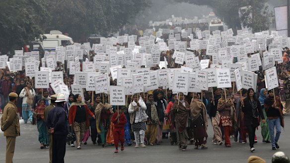 Women march against rape in the Indian capital shortly after the victim of the December 2012 New Delhi gang rape was cremated.