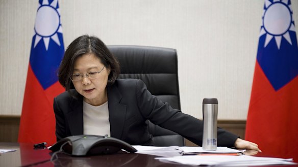 A photo released by Taiwan's Presidential Office shows President Tsai Ing-wen speaking with Donald Trump in Taipei on Friday.