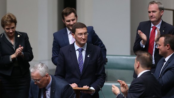 Mr Leeser is congratulated by other MPs after delivering his first speech.