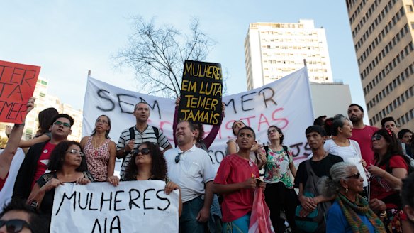 People protest the interim government of Michel Temer in Sao Paulo, Brazil, on Sunday, where some of the signs read "Women will fight" and "Never Temer" (Temer is also Portuguese for 'fear'.) 