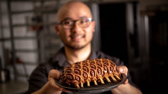 Chef Khanh Nguyen with his incredible decorated pastry-coated lamb.