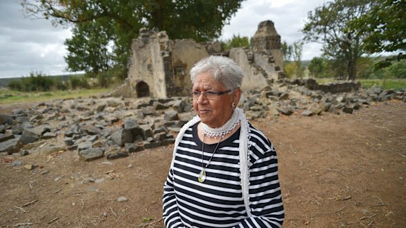 Laura Bell, Frederick Lovett's daughter, walks through the ruins at the Aborginal Mission station, Lake Condah. The five Lovett brothers lived here after returning from World War I.
