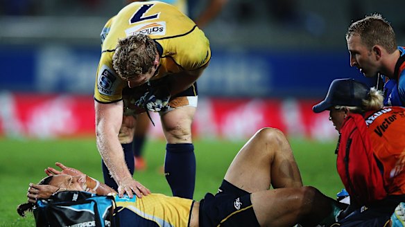 David Pocock of the Brumbies checks on Matt Toomua during the team's last trip to Eden Park.