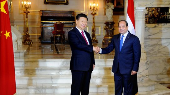 Egyptian President Abdel Fattah al-Sissi, right, shakes hands with Chinese President Xi Jinping.