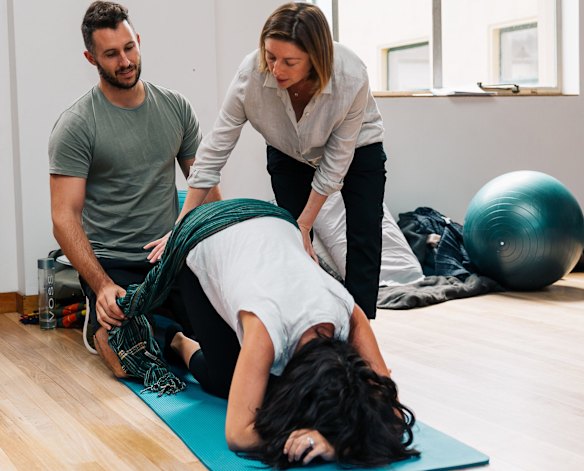 Nadine works with a couple on the course.