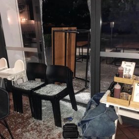 The floor at Teddy Picker's Cafe is covered in glass after thieves used a table to smash through a window during an overnight break-in.