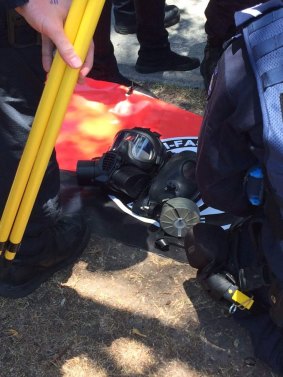 A knife, a gas mask and a red banner saying "Anti-Fascist Action" were allegedly found on G20 protesters.
